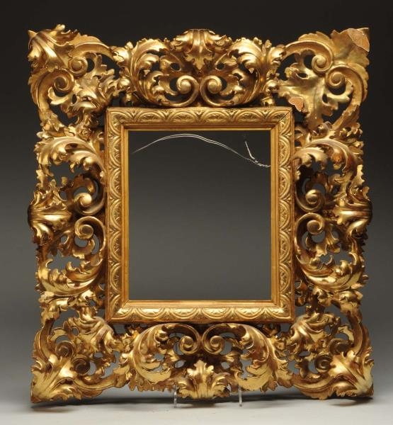 GOLD GILT WOOD AND GESSO FRAME.                   