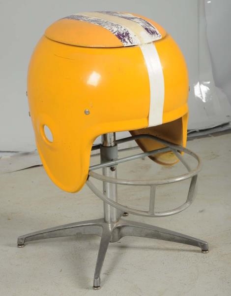 FOOTBALL HELMET CHAIR FROM VIKINGS CLUBHOUSE.     