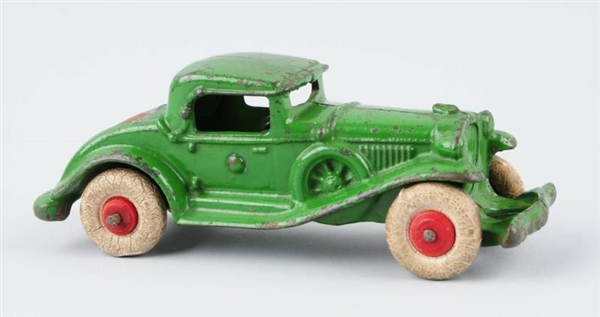 CAST IRON WILLIAMS GREEN COUPE WITH RUMBLE SEAT.  