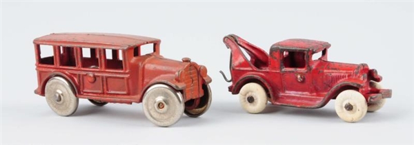 LOT OF 2: CAST IRON TRUCK/BUS.                    