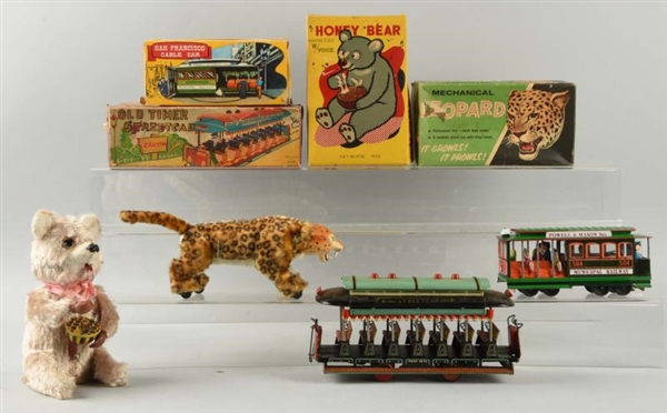 LOT OF 4: JAPANESE WIND UP & FRICTION TOYS.       
