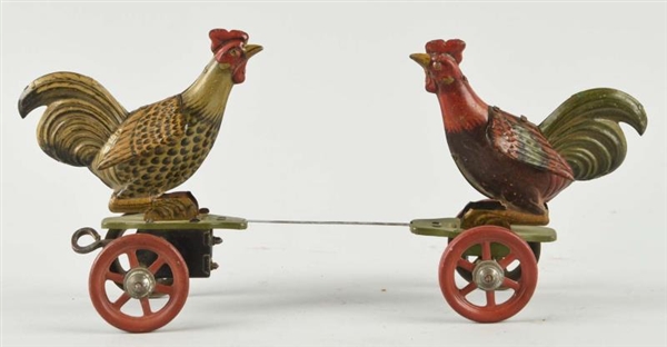 GERMAN TIN LITHO ROOSTERS FIGHTING TOY.           