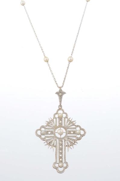 AN EDWARDIAN PEARL AND DIAMOND PENDANT NECKLACE.  