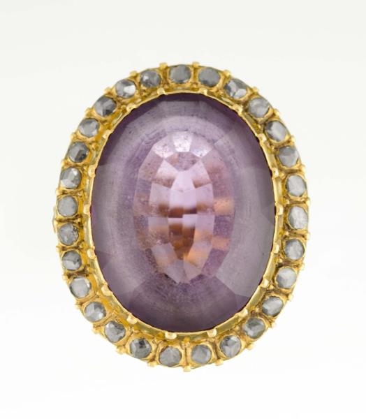 AN AMETHYST AND DIAMOND RING.                     