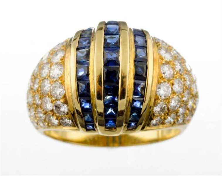 A SAPPHIRE AND DIAMOND RING.                      