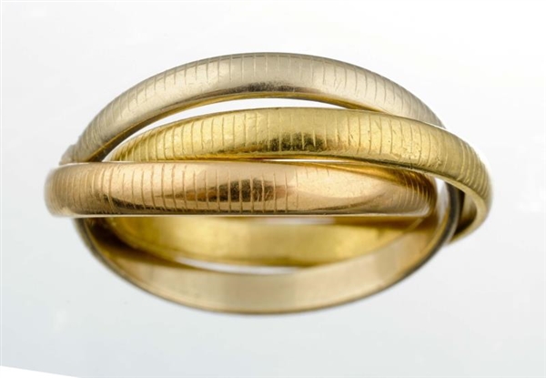 A TRICOLOR GOLD RING, CARTIER.                    