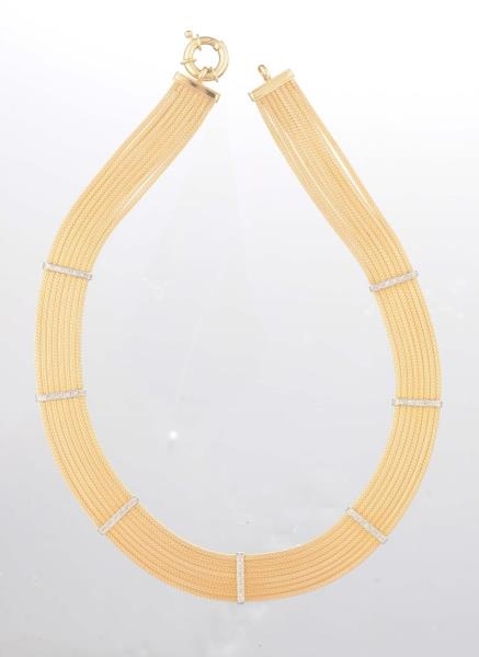 A DIAMOND AND GOLD NECKLACE.                      