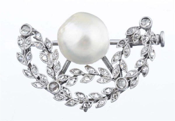 A PEARL AND DIAMOND BROOCH.                       