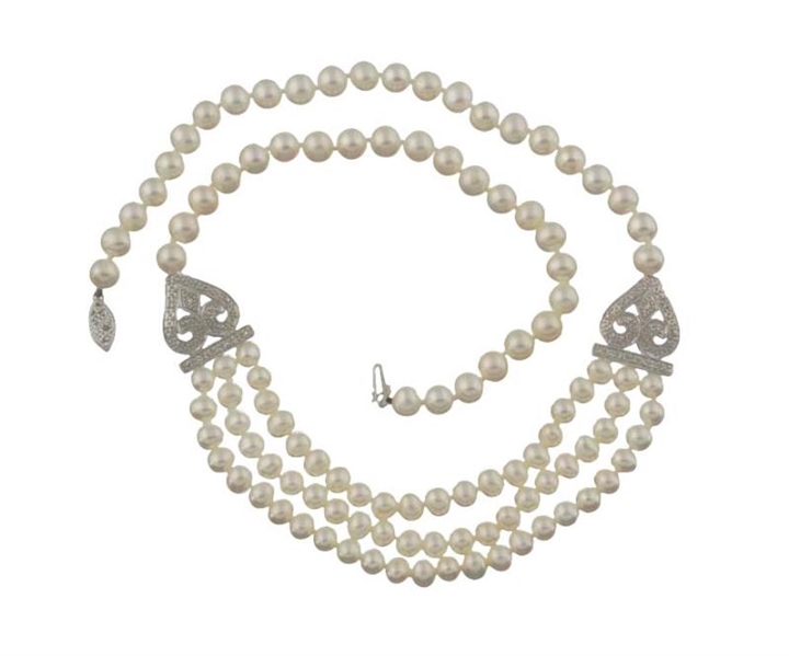 A PEARL AND DIAMOND NECKLACE.                     
