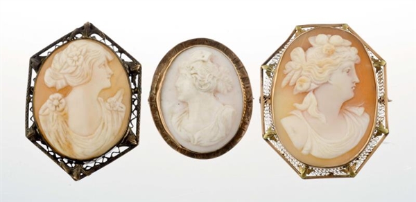 A GROUP OF THREE SHELL CAMEO BROOCHES.            