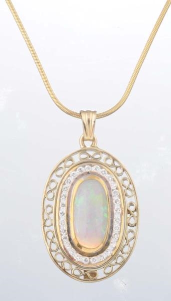 AN OPAL AND DIAMOND PENDANT NECKLACE.             