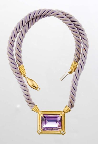 AN AMETHYST AND DIAMOND NECKLACE, G. PETOCH.      