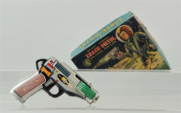 BATTERY-OPERATED SPACE PISTOL IN BOX.             