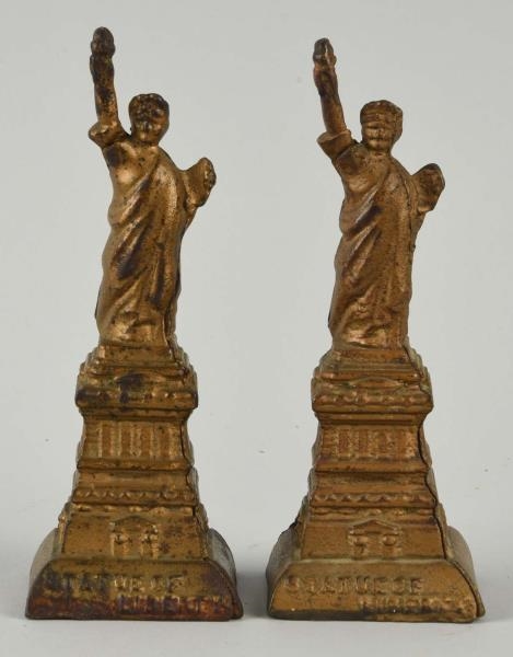 LOT OF 2: AC WILLIAMS GOLD STATUE OF LIBERTY BANKS