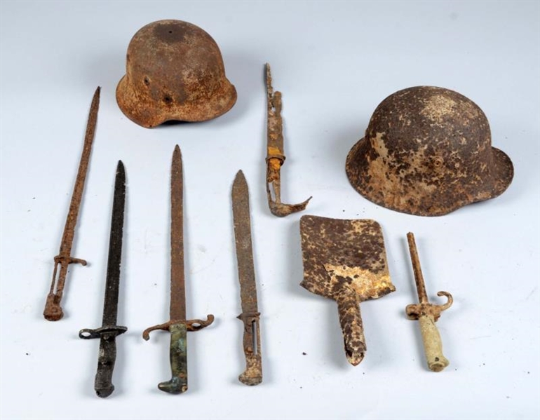 LOT OF 9: EXCAVATED WORLD WAR II ITEMS.           
