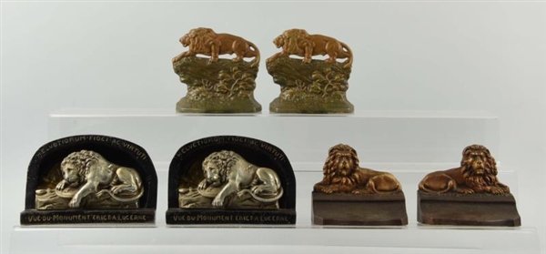 LOT OF 3: PAIRS OF CAST IRON LION BOOKENDS.       