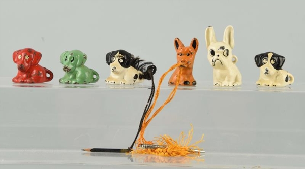 LOT OF 6: CAST IRON ASSORTED DOG PENCIL HOLDERS.  