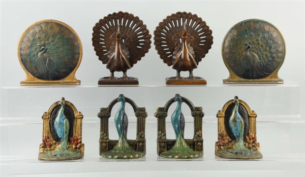 LOT OF 4: PAIRS OF CAST IRON PEACOCK BOOKENDS.    