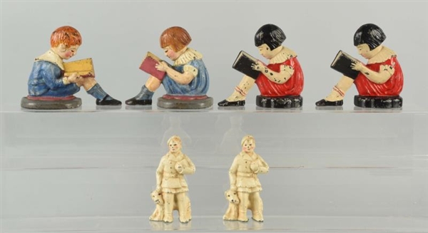 LOT OF 3: PAIRS OF CAST IRON CHILDREN BOOKENDS.   