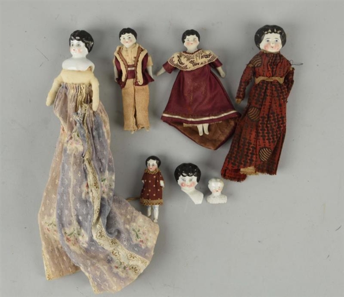 LOT OF 7: ANTIQUE CHINA DOLLS & HEADS.            