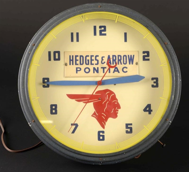 1940’S PONTIAC HEDGES & ARROW NEON CLOCK.         