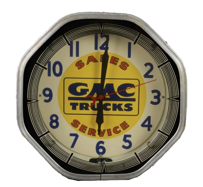 1950’S GMC TRUCK SALES & SERVICE NEON CLOCK.      