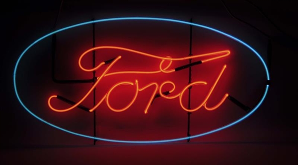 RARE “GENUINE FORD PARTS” OVAL SKELETON NEON SIGN.