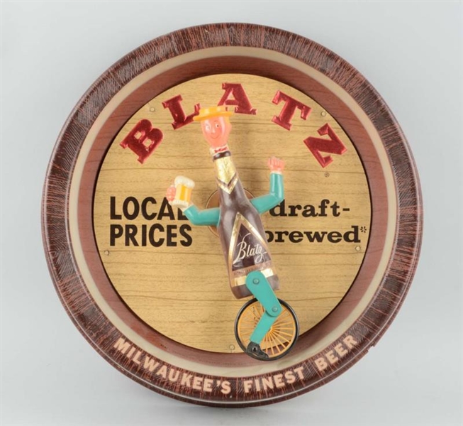 BLATZ BEER UNICYCLE MOTION SIGN.                  