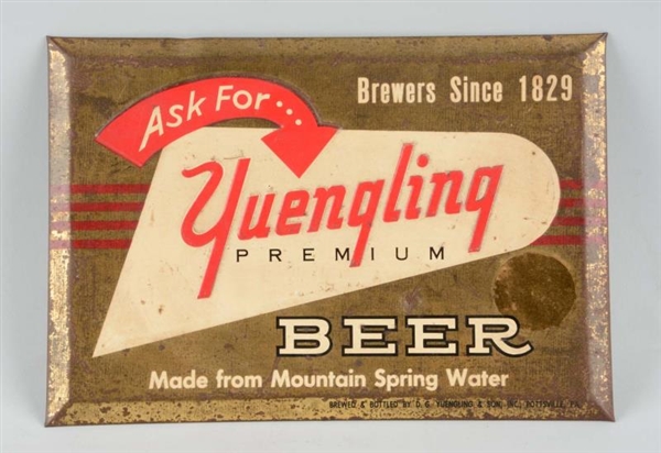YUENGLING BEER TIN OVER CARDBOARD SIGN.           