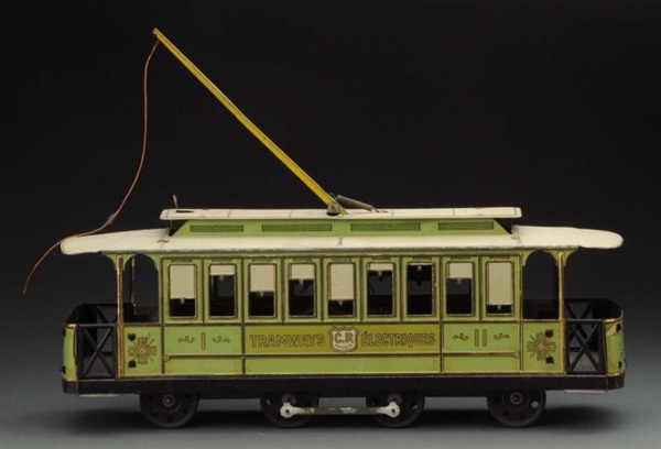 EARLY FRENCH TIN PLATE WIND-UP TRAM.              