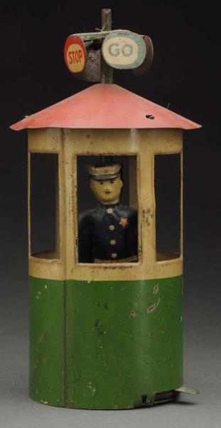 AMERICAN-MADE POLICE OFFICER IN TIN LITHO STAND.  