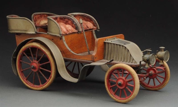 EARLY FRENCH CLOCKWORK AUTOMOBILE.                