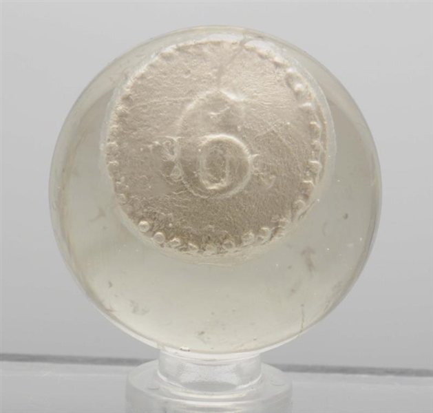 NUMERAL 6 ON A DISC SULPHIDE MARBLE.              