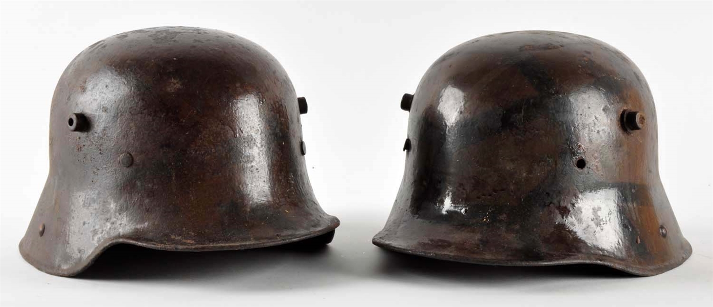 LOT OF 2: WWI GERMAN CAMOUFLAGE HELMETS.          