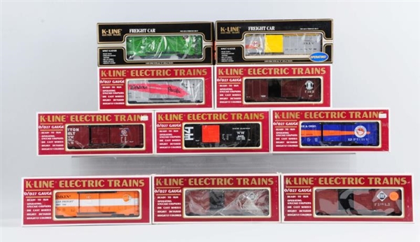 LOT OF 10: K - LINE TRAINS IN BOXES.              