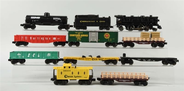 LOT OF 11: ASSORTED LIONEL TRAINS.                