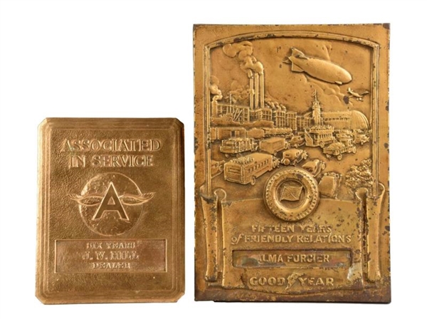 LOT OF 2: BRASS ADVERTISING PLAQUES.              