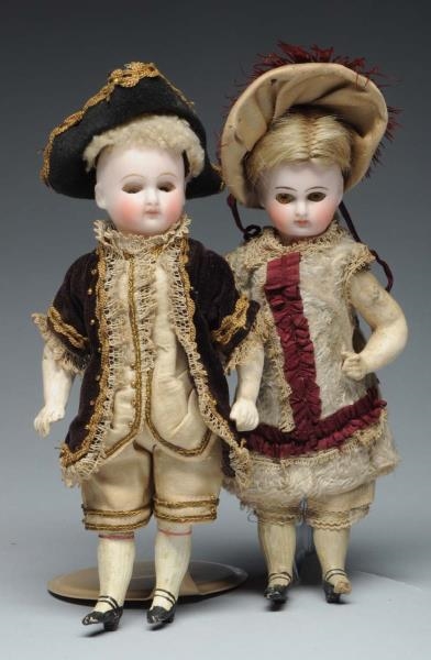 LOT OF 2: BISQUE TYPE DOLLS.                      