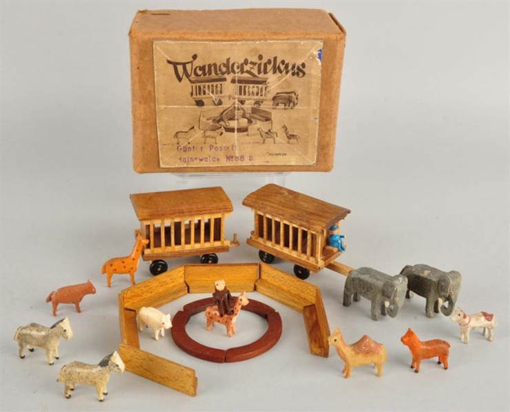 MINIATURE WOODEN CIRCUS ANIMALS WITH 2 CAGES.     