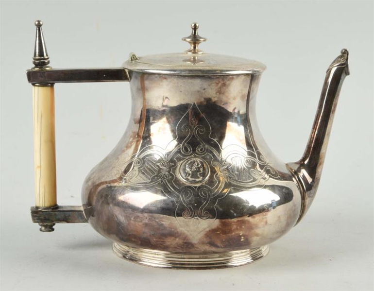 IVORY HANDLED SILVER PLATE TEAPOT.                