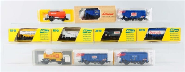 LOT OF 10: LILIPUT ADVERTISING FREIGHT CARS.      