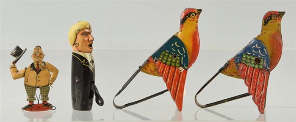 LOT OF 4: ASSORTED TIN TOYS.                      