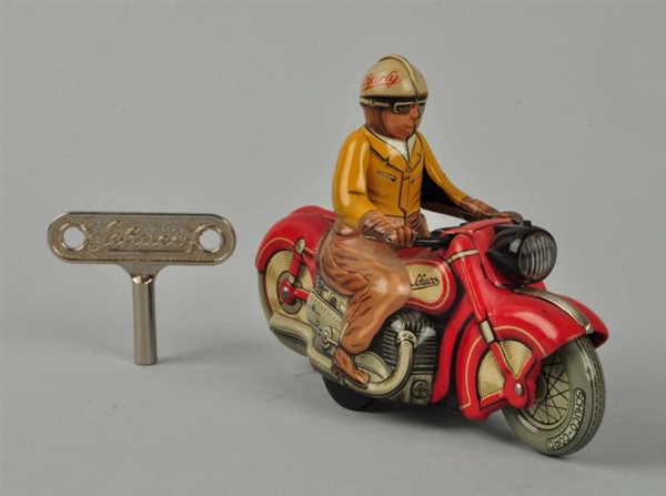 GERMAN SCHUCO TIN LITHO MOTORCYCLE TOY.           