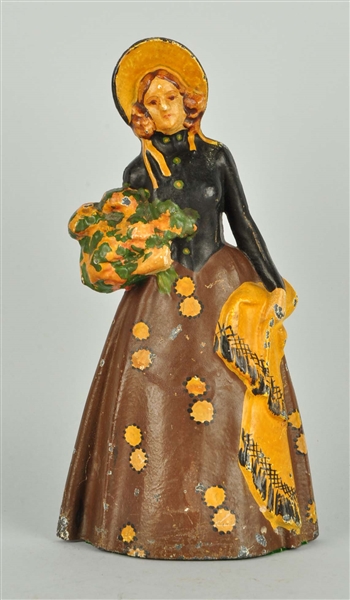 CAST IRON LADY WITH FLOWER BOUQUET DOORSTOP.