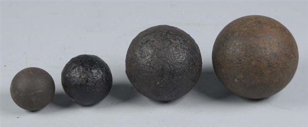  LOT OF 4:  EXCAVATED CANNON BALLS.               