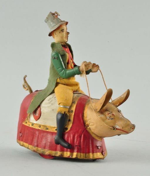 GERMAN LEHMANN TIN WIND-UP PADDY & THE PIG TOY.   