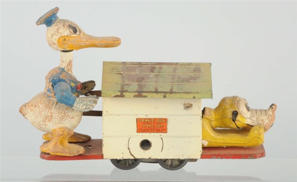 LIONEL DONALD DUCK WIND UP HAND CAR TOY.          
