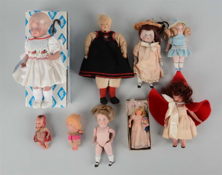 LOT OF 9:  VINTAGE SMALL DOLLS.                   