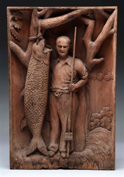 HANDCARVED WOODEN MAN WITH FISH.                  