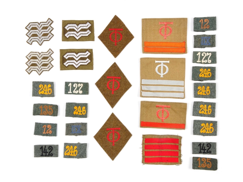 LOT OF 28: BOARD SLIP-ONS AND INSIGNIAS.          
